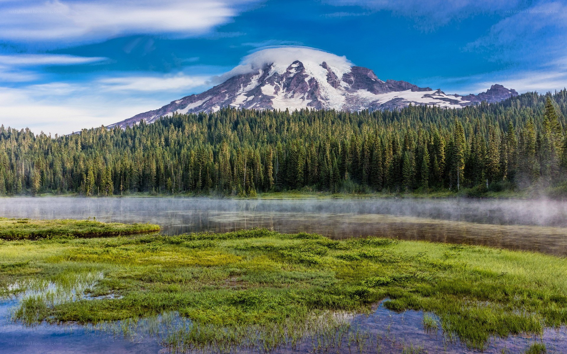 Mount Rainier with misty lake