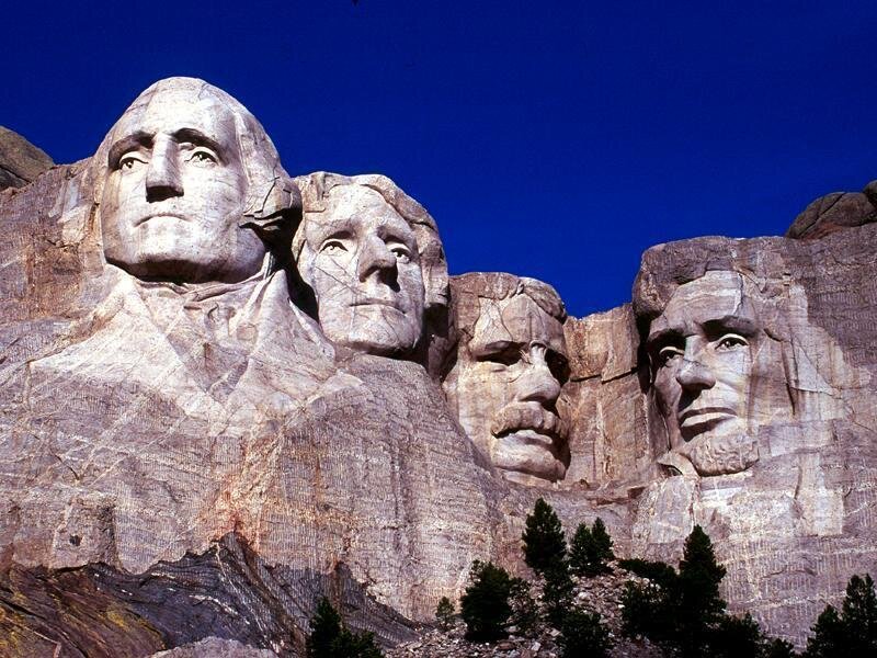 Mount Rushmore Monument — Blue, Dramatic, Afternoon, Photograph, Rock Faces, Trees