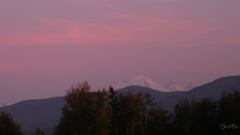 mountain at dusk with pink sky