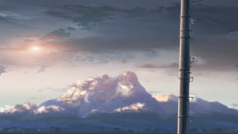 mountain at sunset with utility pole