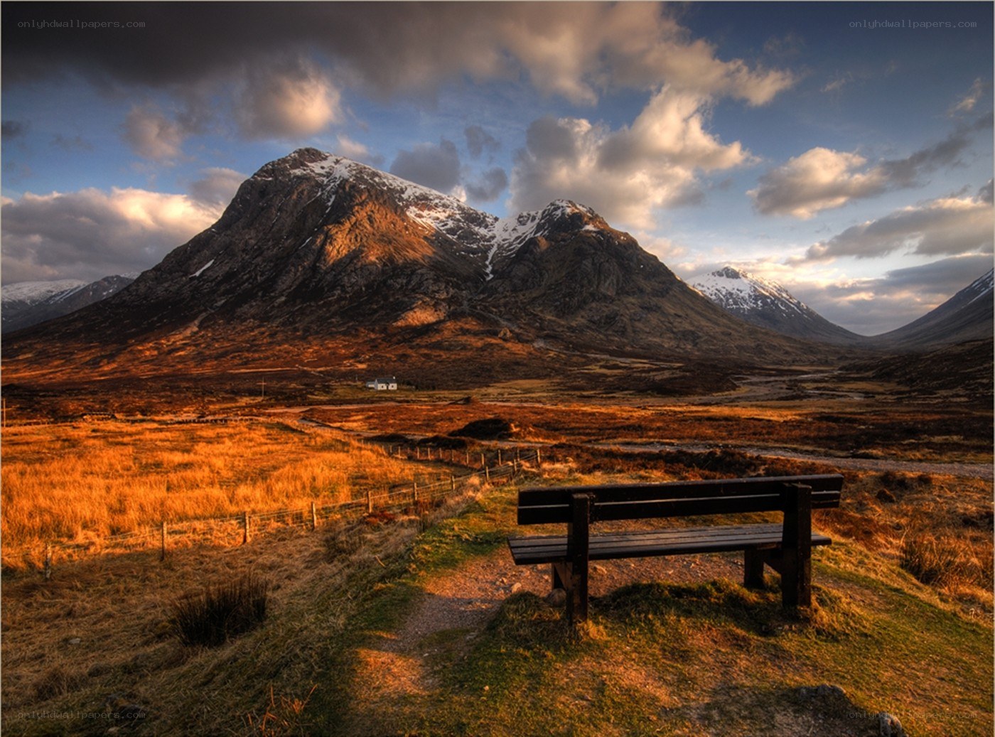 Mountain bench at sunset