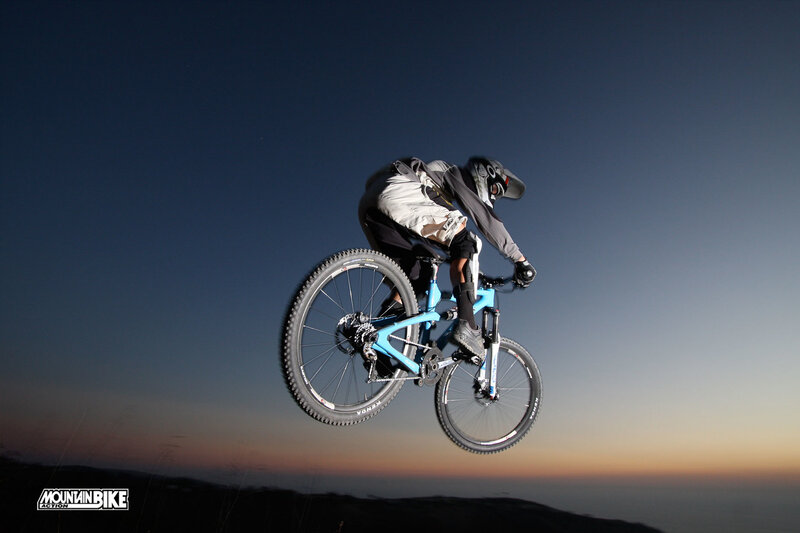 Mountain Biker in Mid-air — Blue, Dramatic