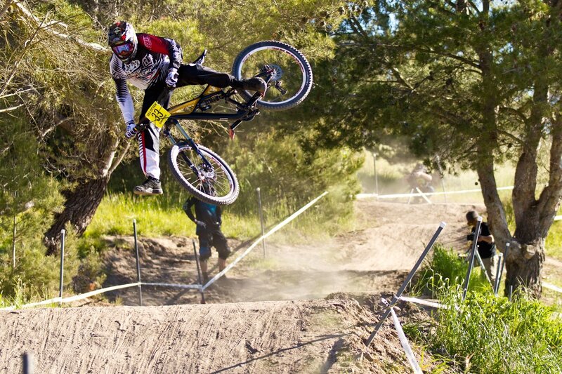 Mountain biker in mid-air jump