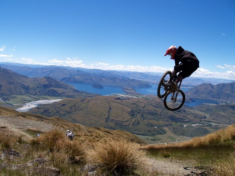 Mountain biker in mid-air jump