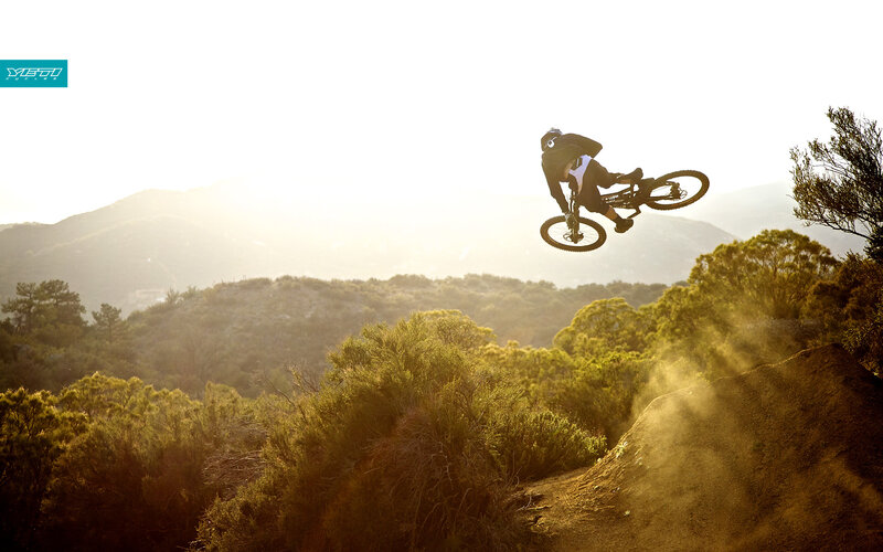 Mountain biker in mid-air jump