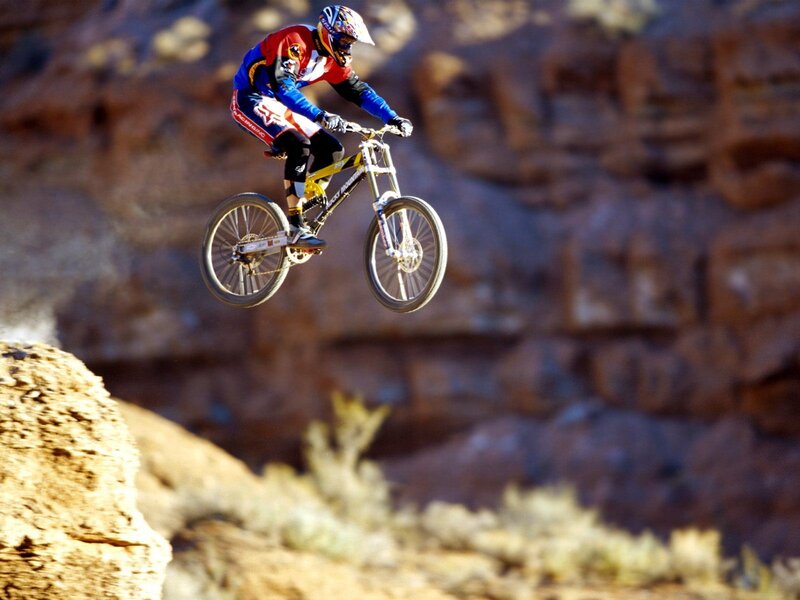 Mountain biker in mid-air jump