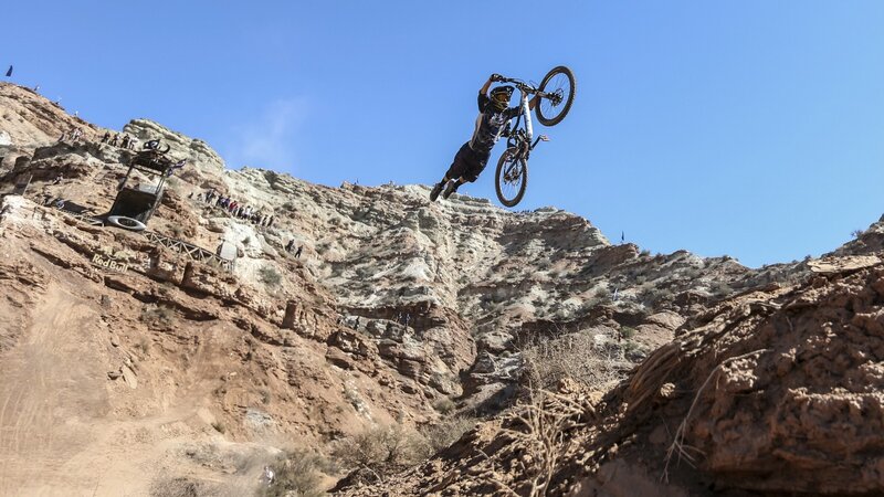 Mountain biker in mid-air jump