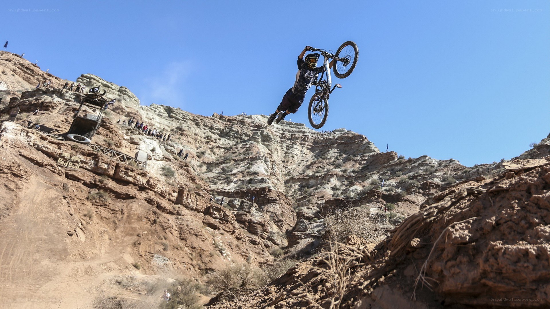 Mountain biker in mid-air jump