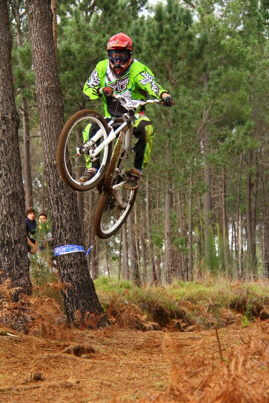Mountain biker in mid-air jump