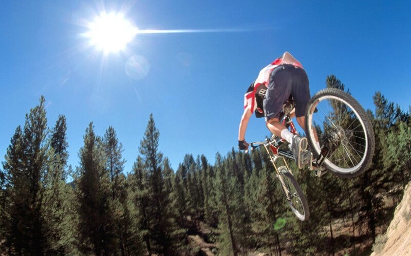 Mountain biker in mid-air jump