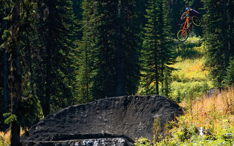 Mountain biker in mid-air jump