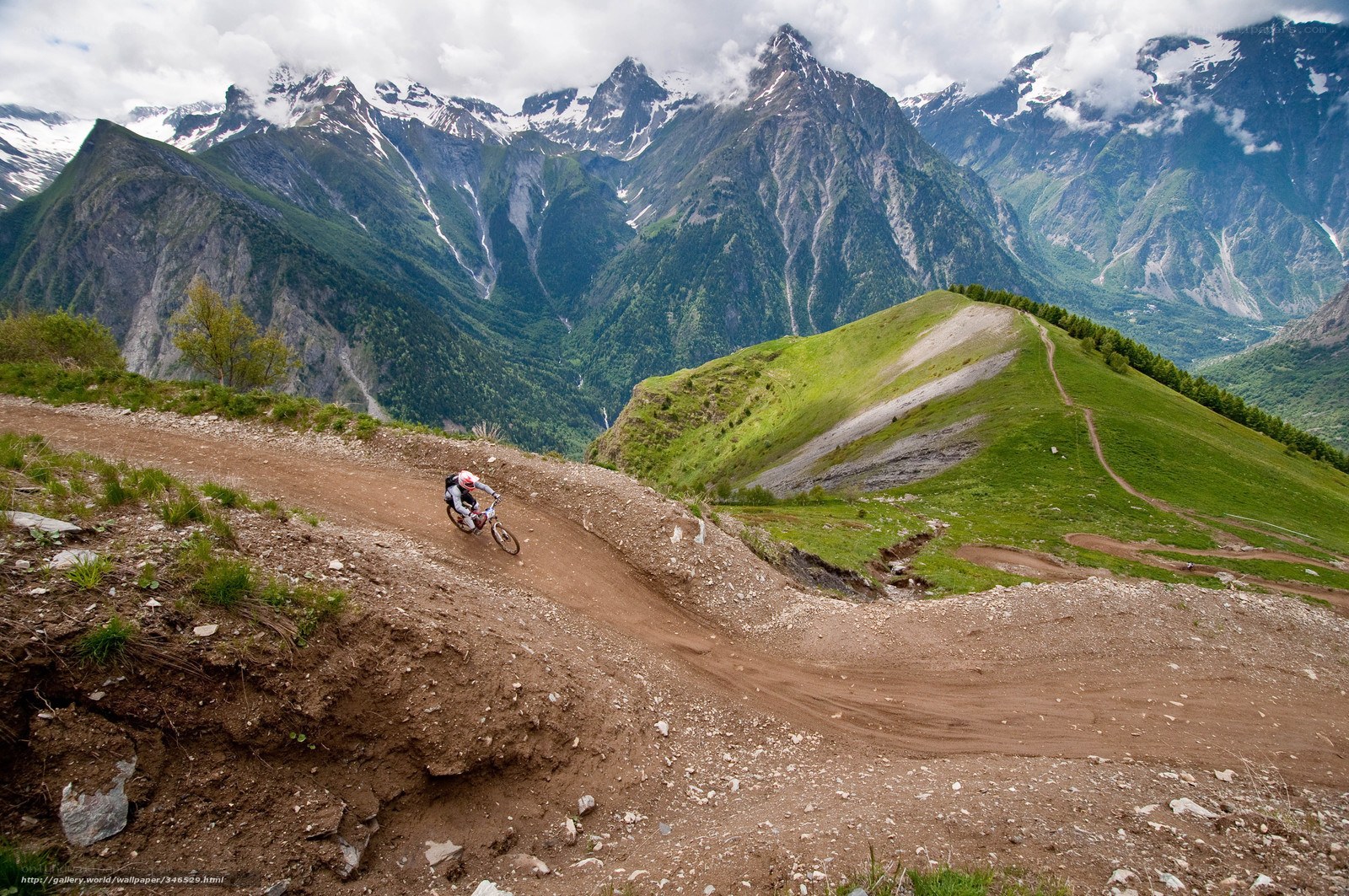 Mountain biker on a dirt trail