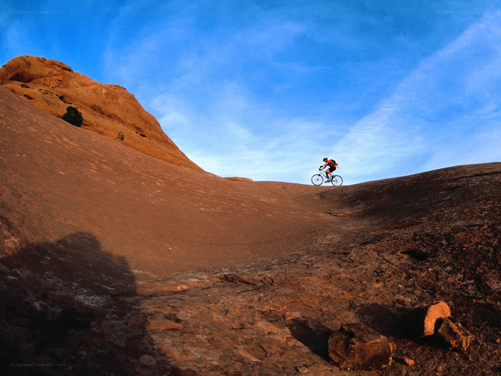 Mountain biker on a rocky slope