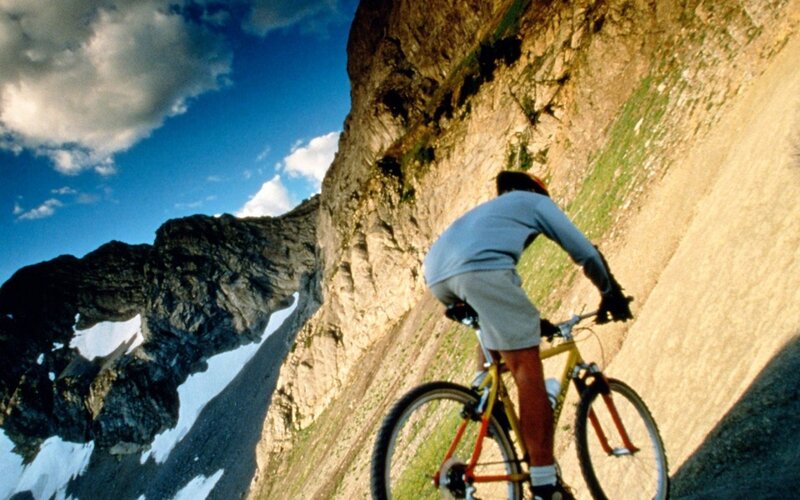 Mountain biker on a steep trail