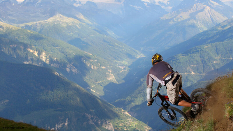 Mountain Biker on Cliff — Green