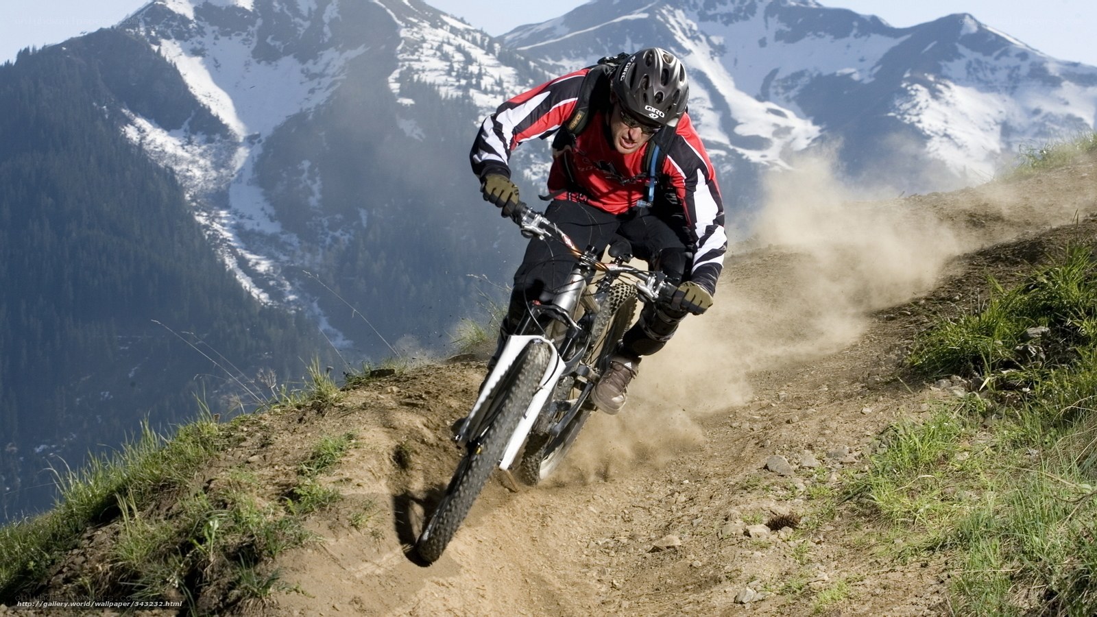 Mountain biker on dusty trail