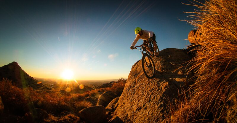 Mountain Biker on Rock — Blue, Dramatic