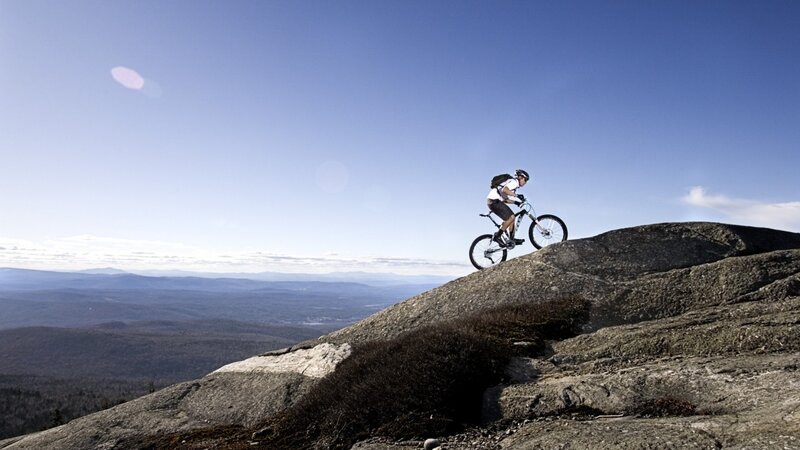 Mountain Biker on Rock — Blue, Serene