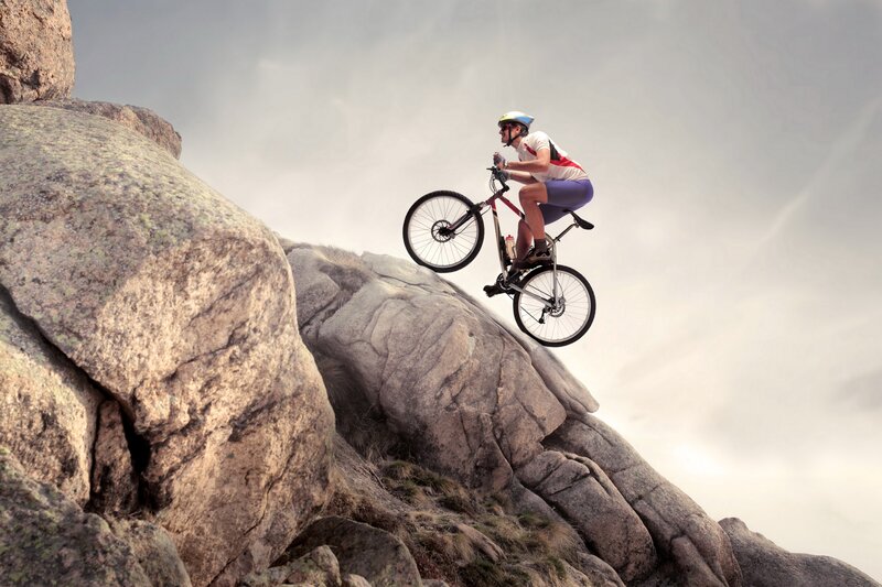 Mountain Biker on Rock — Gray
