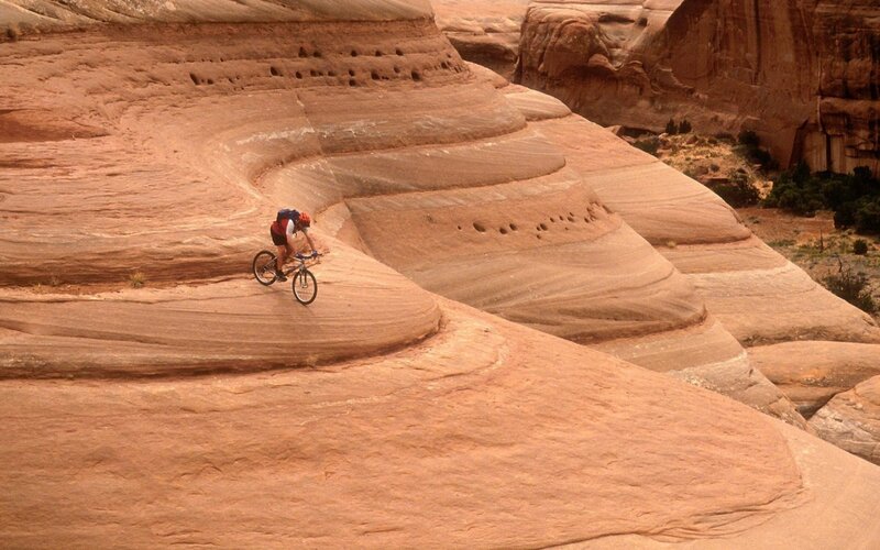 Mountain biker on sandstone
