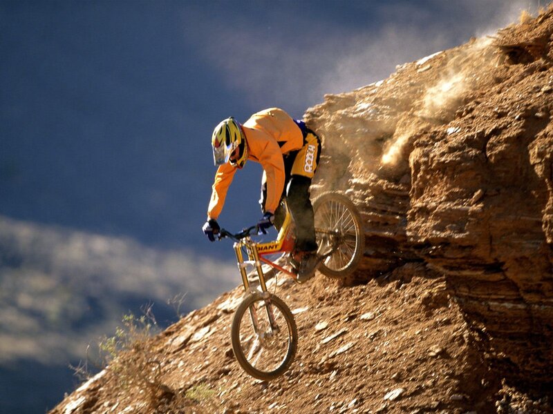 Mountain biker on steep slope