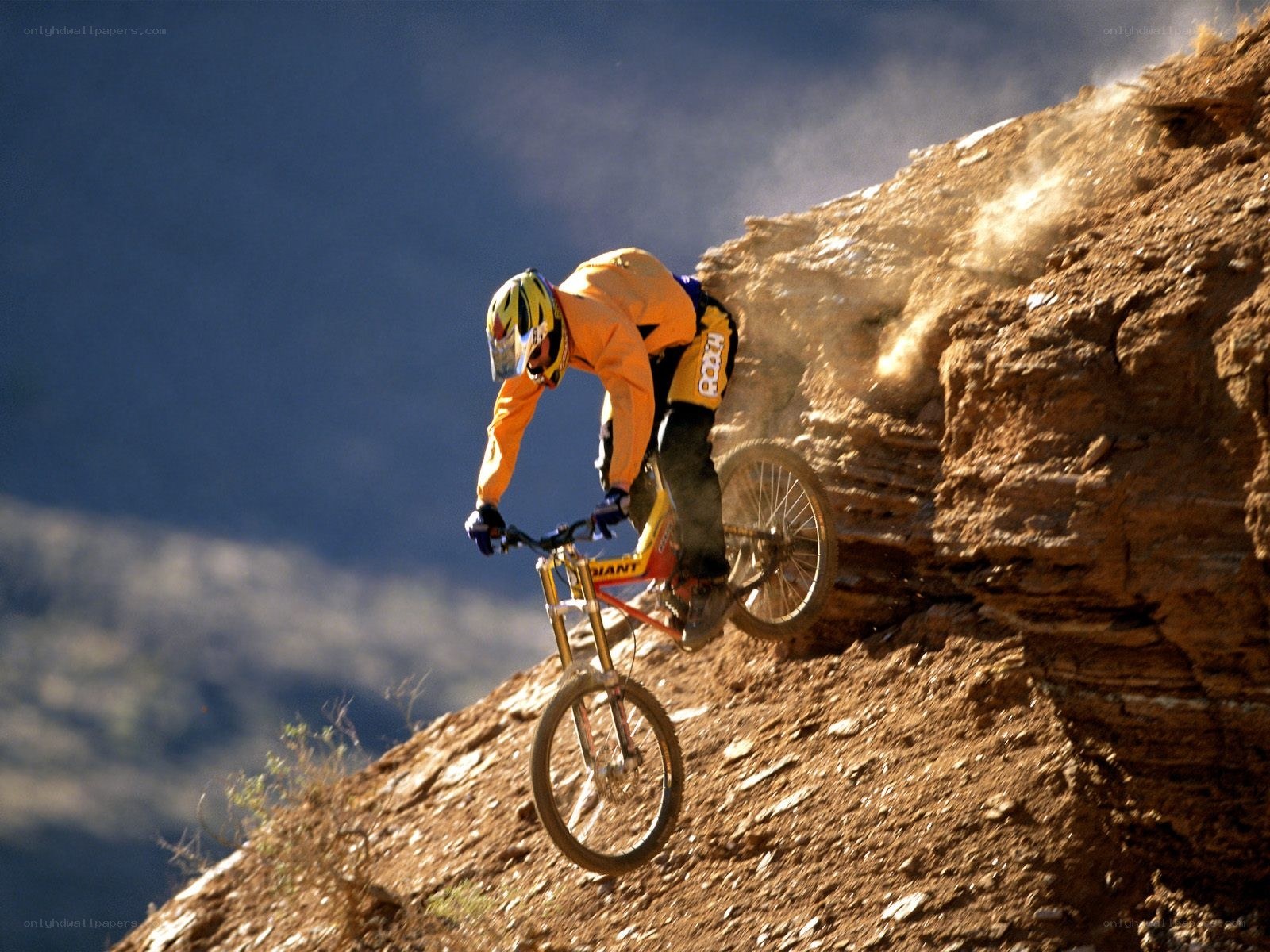 Mountain biker on steep slope