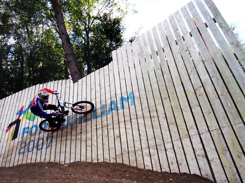 Mountain biker on wooden wall