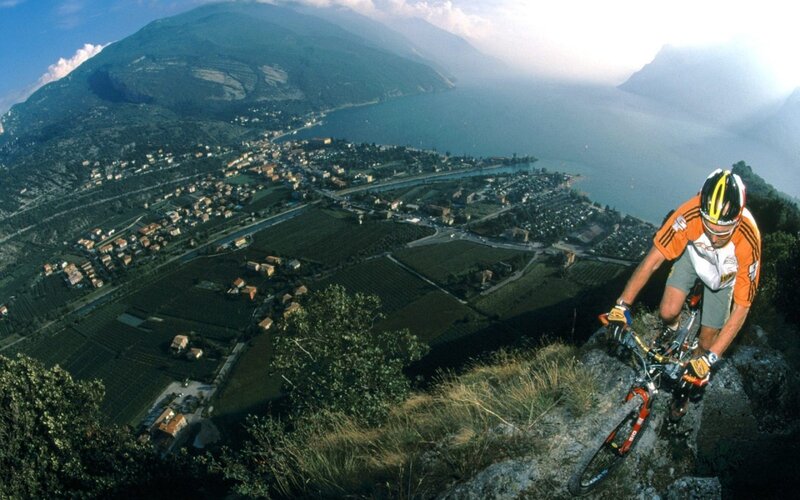 Mountain biker overlooking a lake