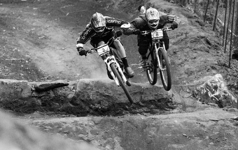 Mountain bikers racing on trail
