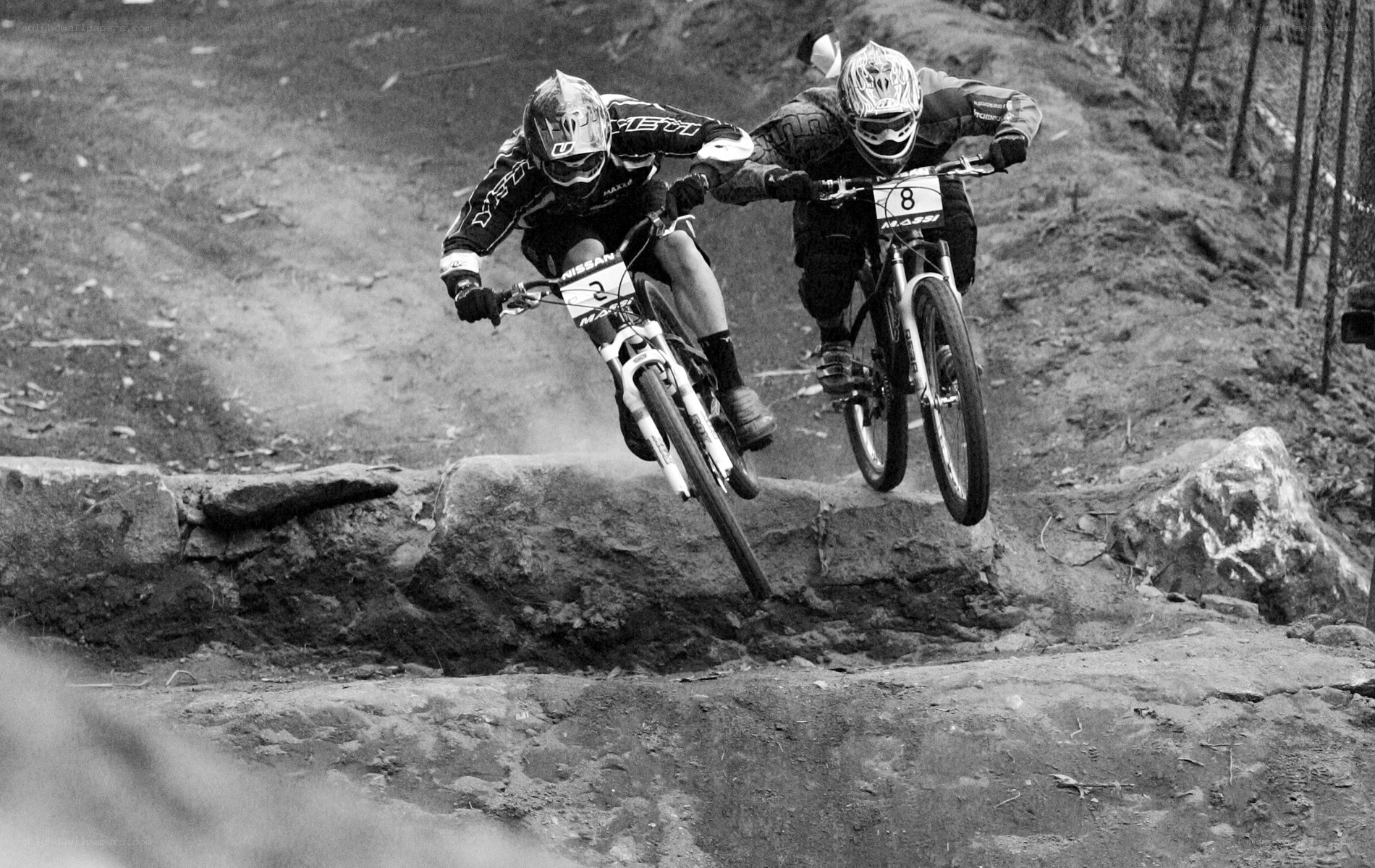 Mountain bikers racing on trail