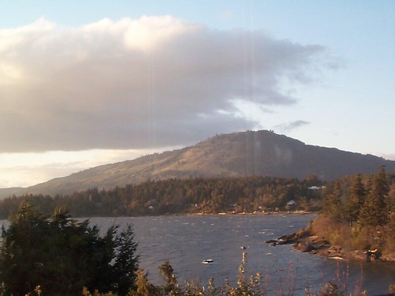 Mountain by the lake at sunset