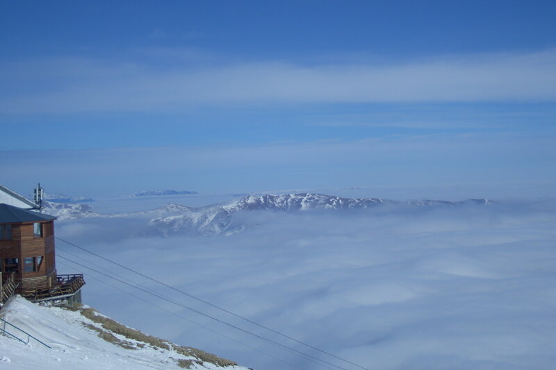 Mountain Cabin Above Clouds