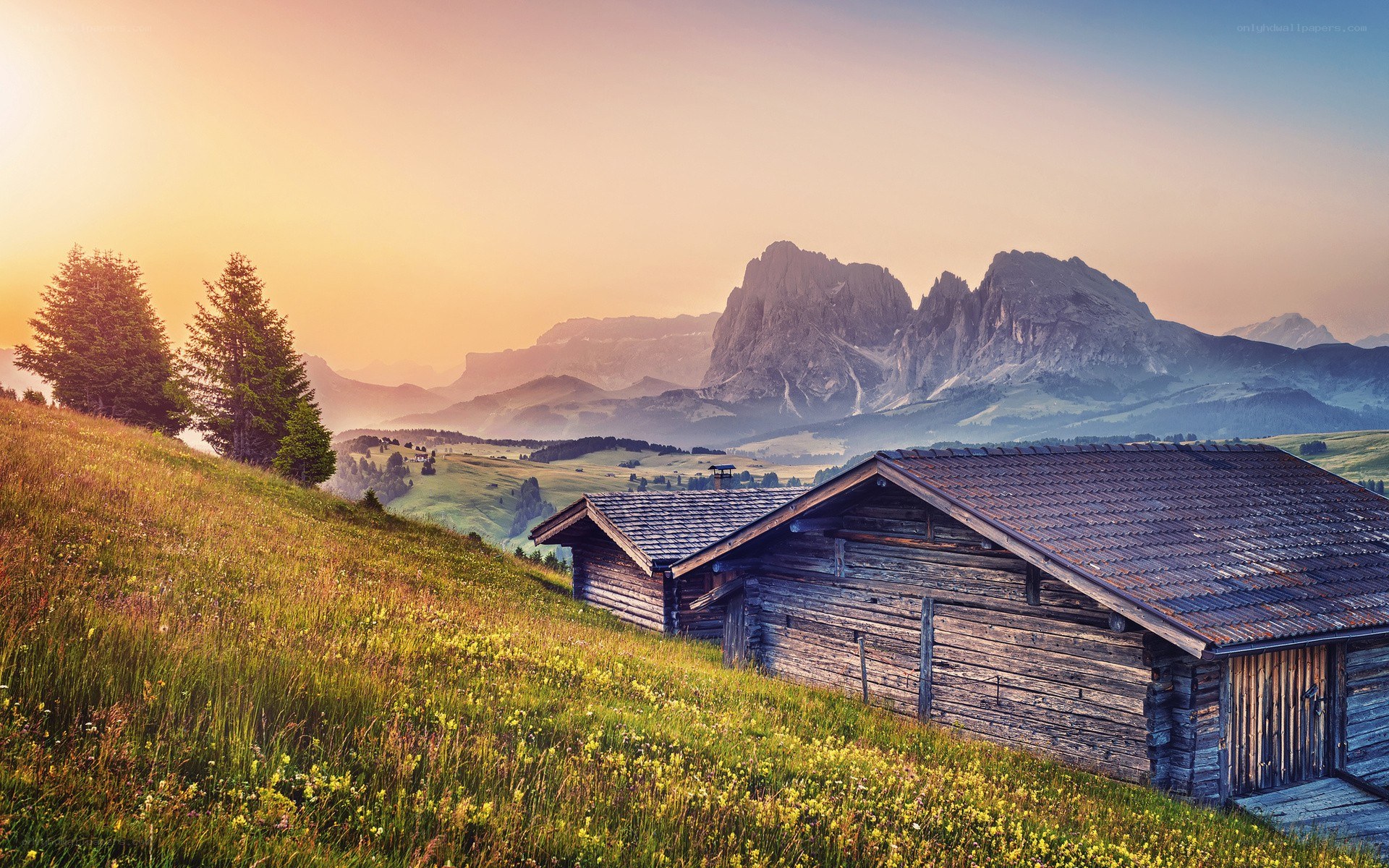 Mountain cabin at sunrise