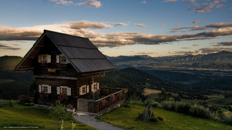 Mountain cabin at sunset