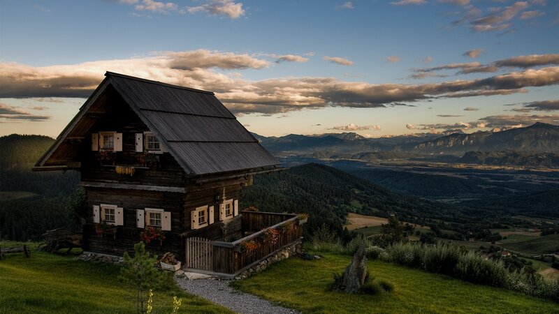Mountain cabin at sunset
