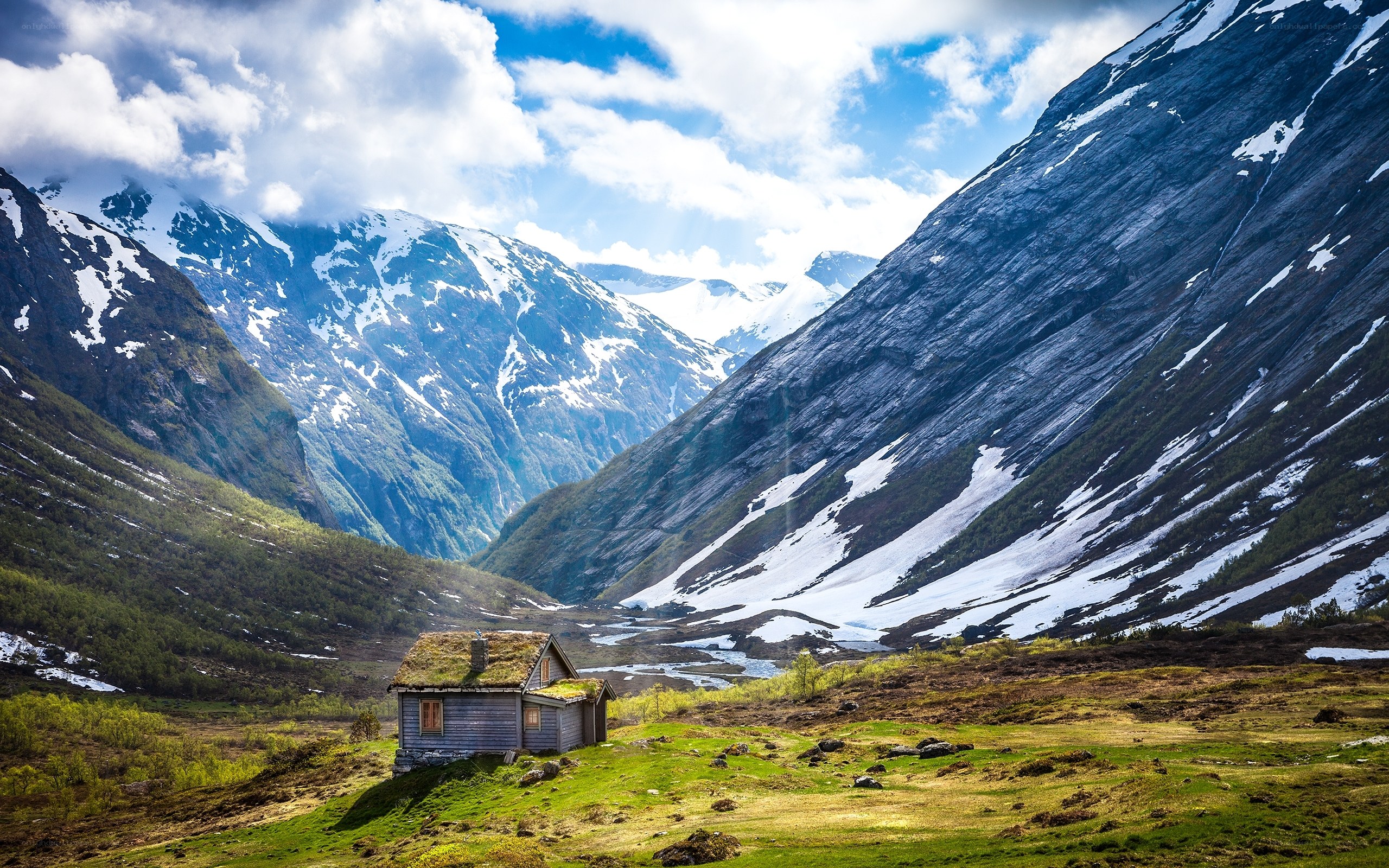 Mountain cabin in a snowy valley