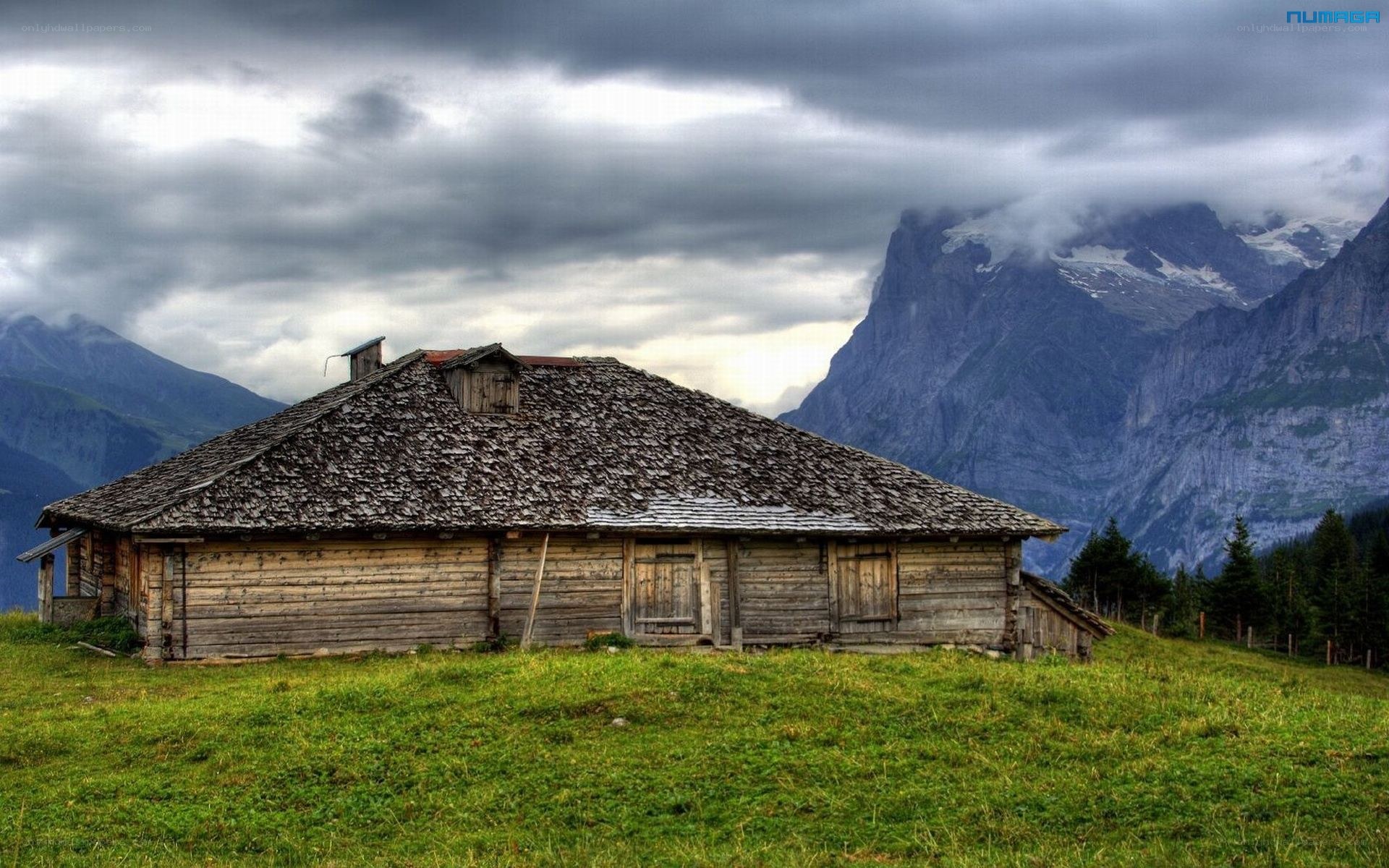 Mountain cabin in alpine landscape