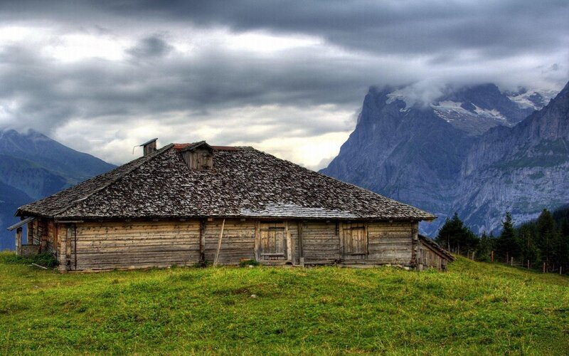 Mountain cabin in alpine landscape