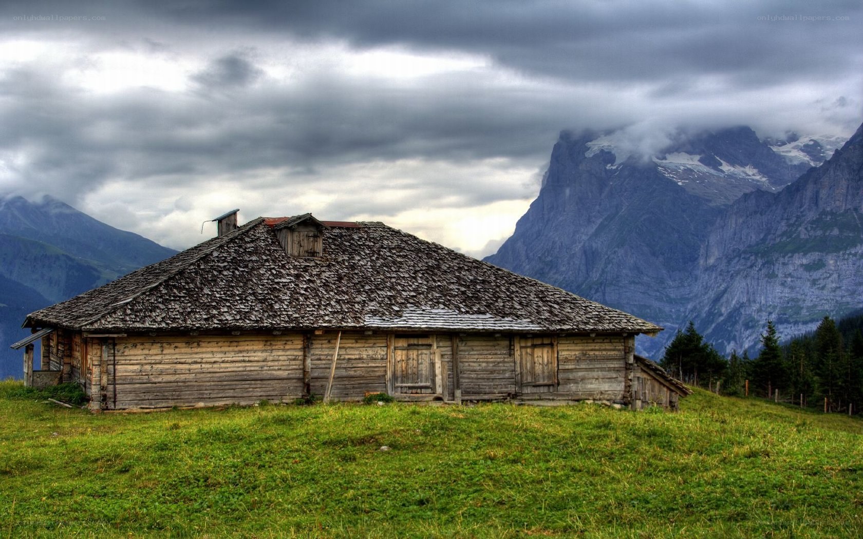 Mountain cabin in alpine landscape