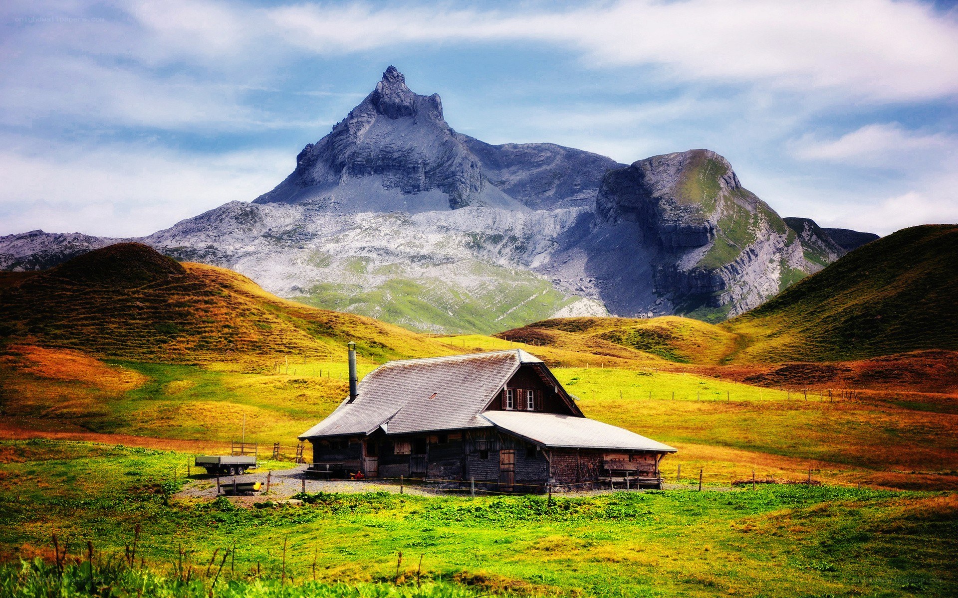 Mountain cabin in alpine valley
