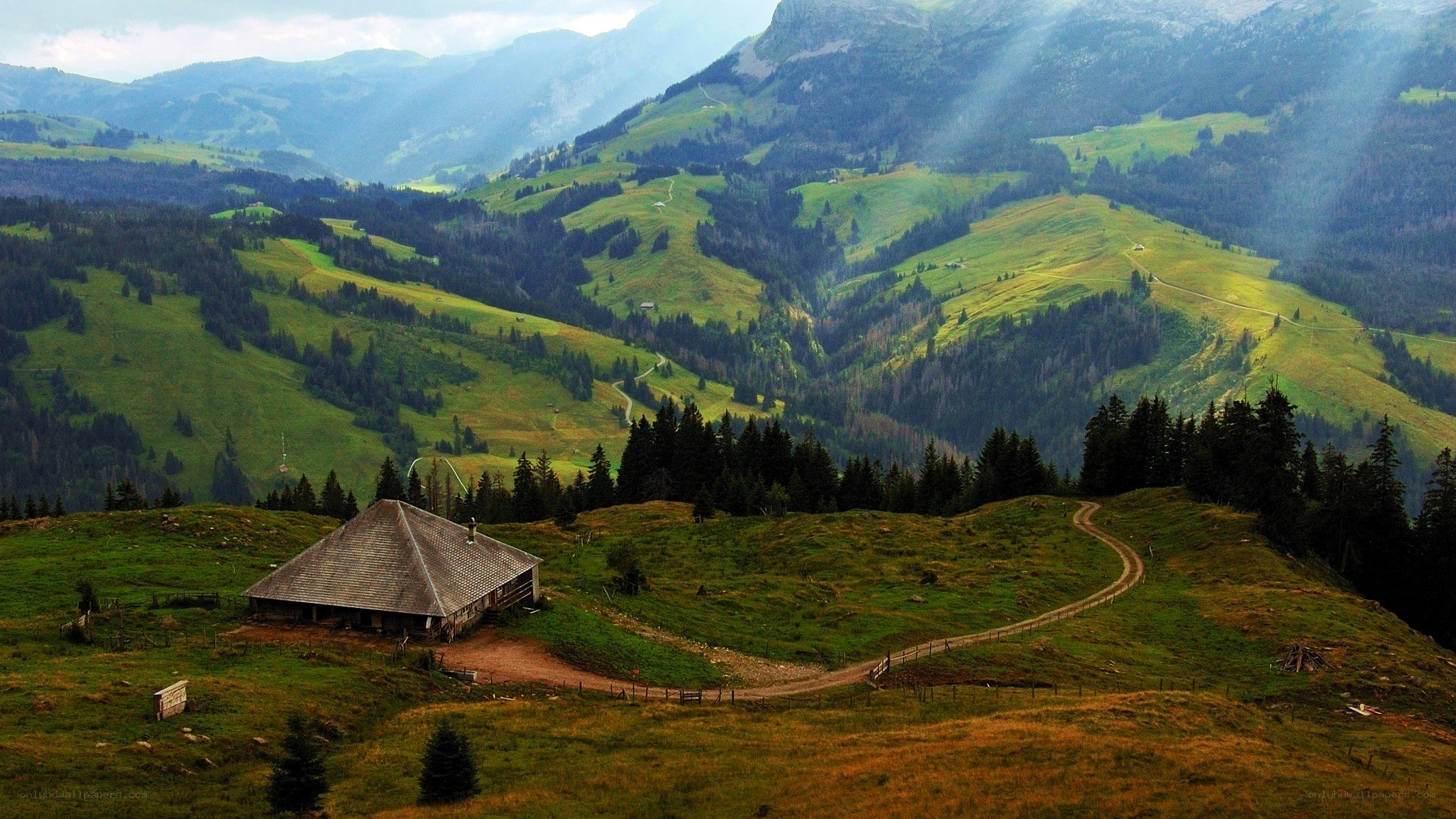 Mountain cabin in alpine valley
