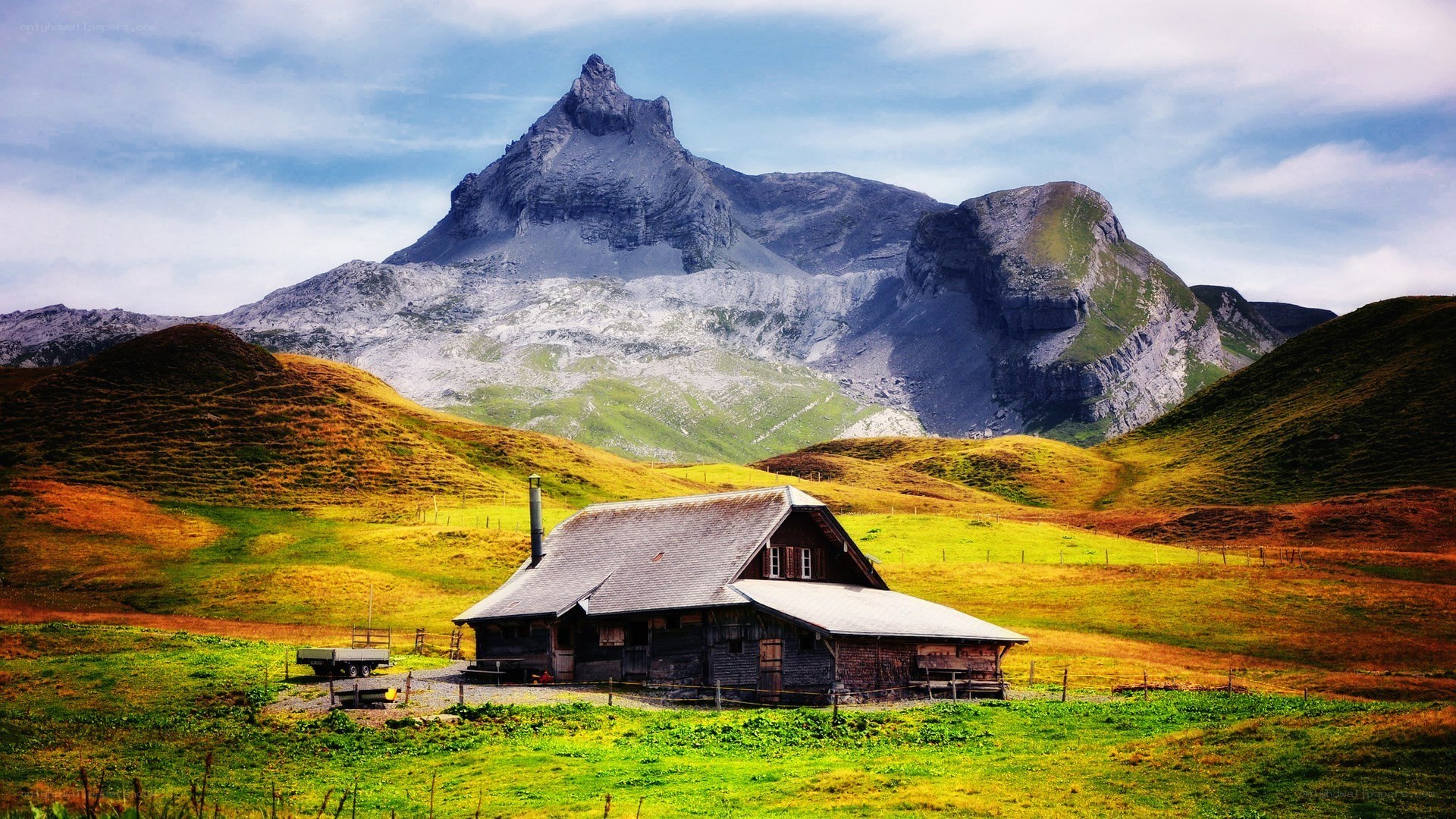 Mountain cabin in alpine valley