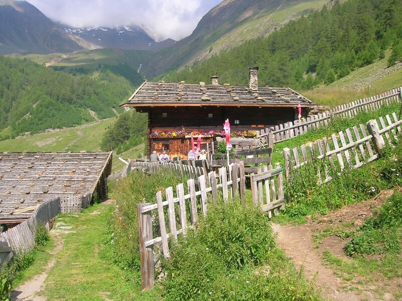 Mountain Cabin in Alpine Valley — Green