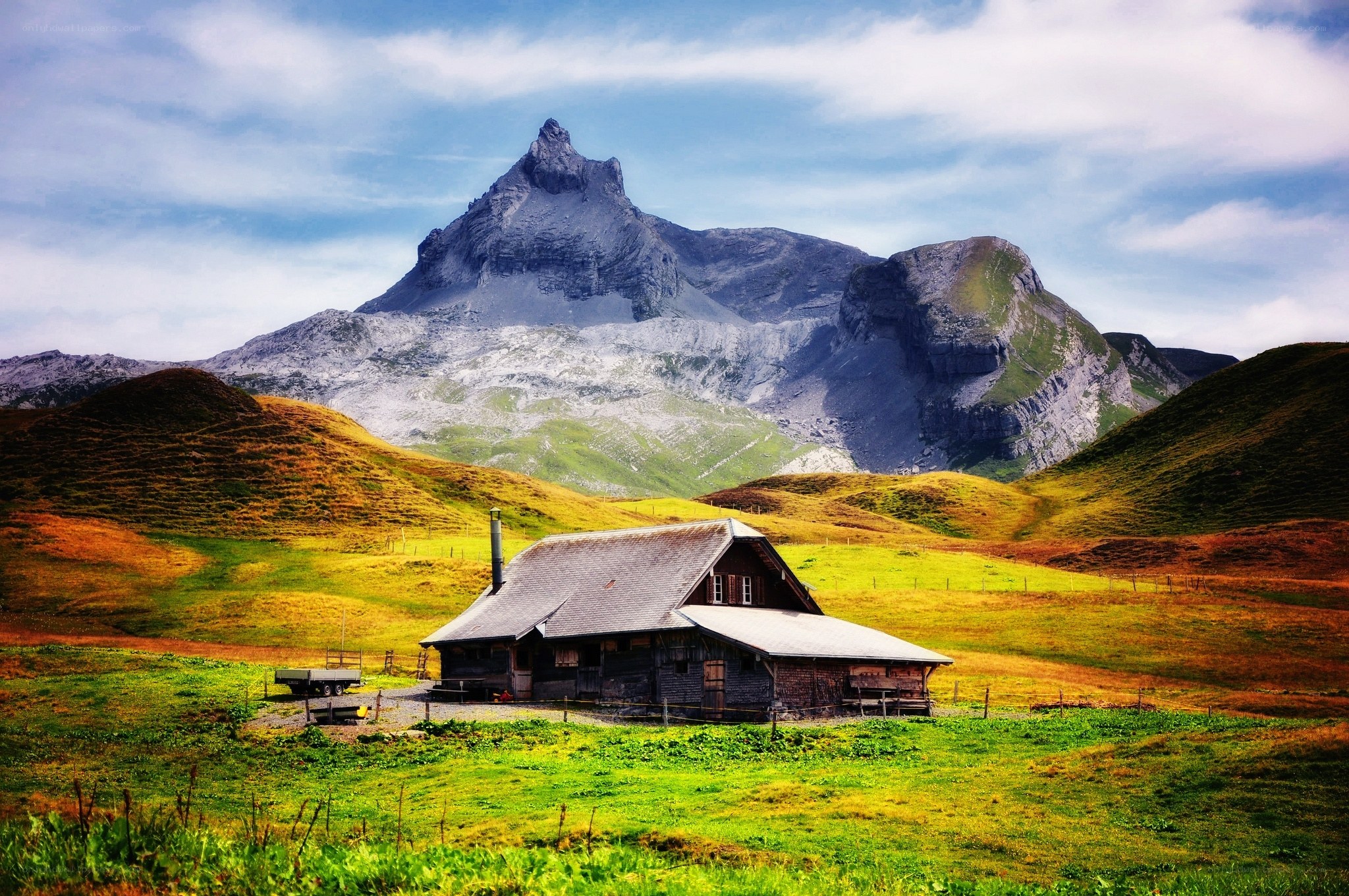 Mountain cabin in alpine valley