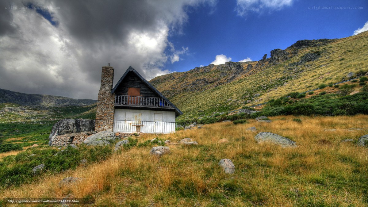 Mountain cabin in rugged landscape
