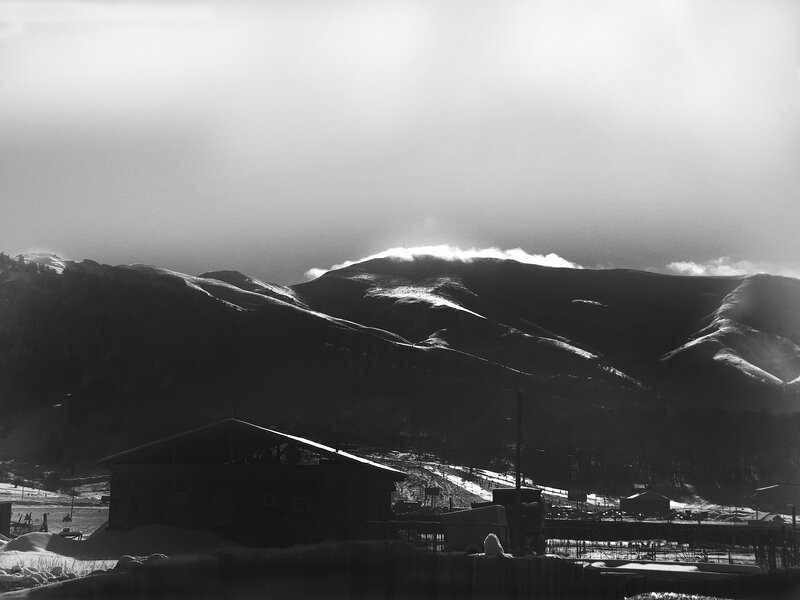 Mountain Cabin in Snow