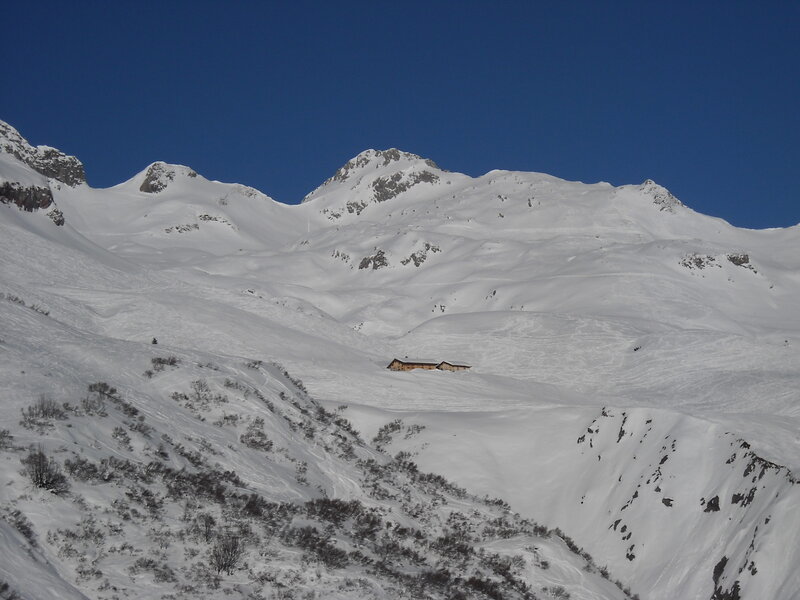 Mountain Cabin in Snow — White, Serene, Winter