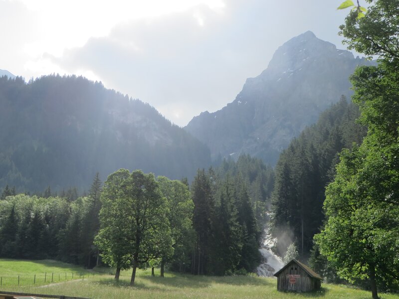 Mountain Cabin in Valley — Green, Serene, Afternoon, Photograph