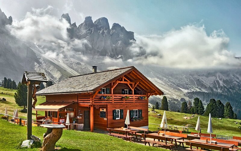 Mountain cabin with scenic backdrop