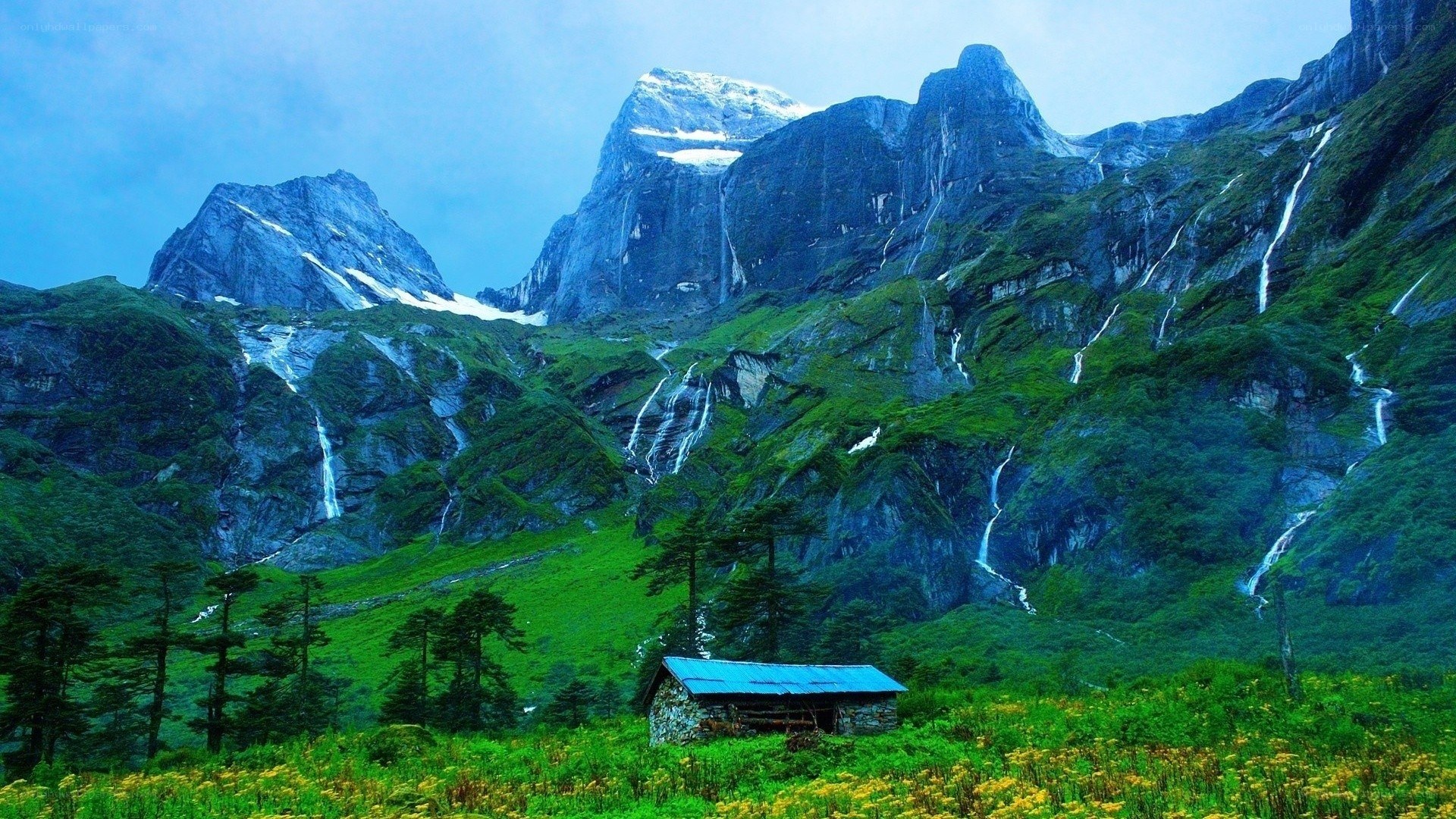 Mountain cabin with waterfalls
